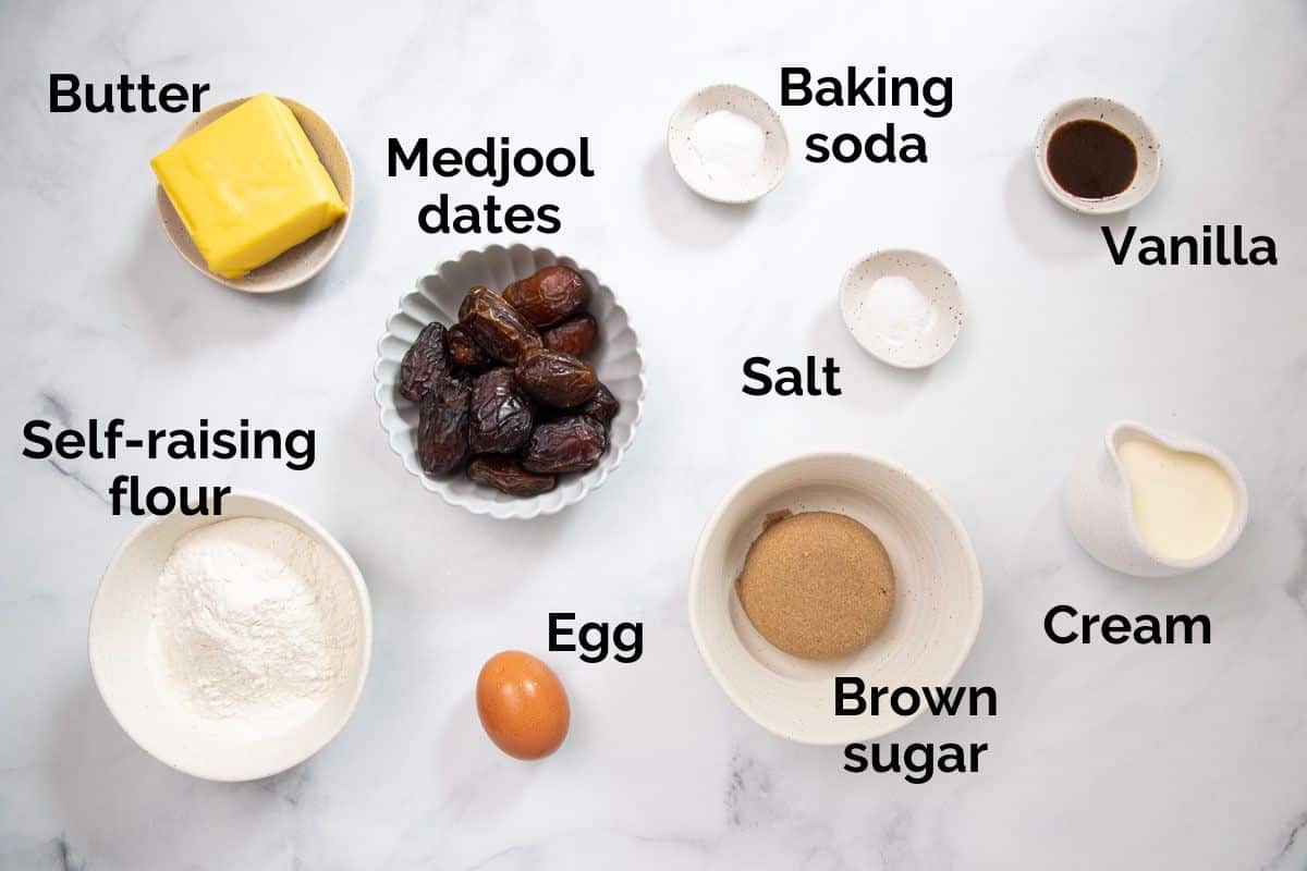 all ingredients for sticky date pudding, laid out on a table.