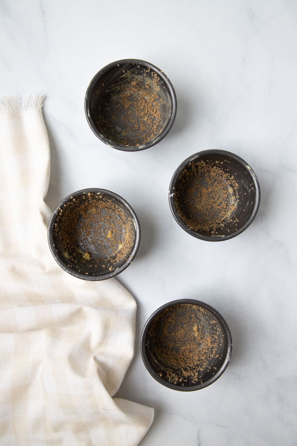 pudding moulds greased and dusted with brown sugar.