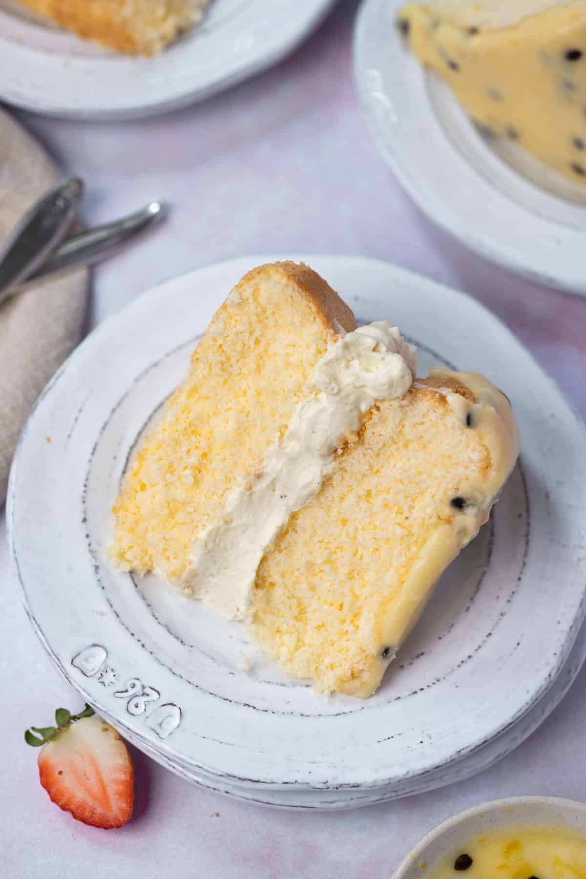 a piece of sponge cake on a white plate.