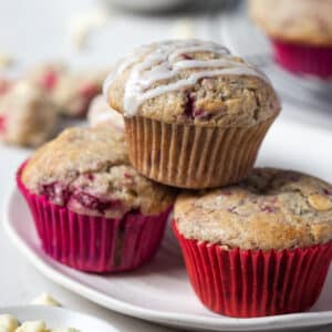 a plate of muffins in colourful cases.