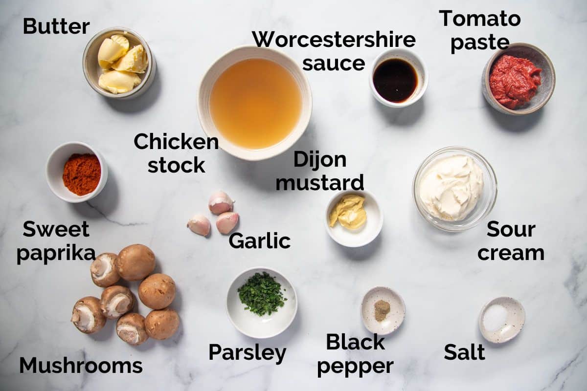 chicken stroganoff ingredients, laid out on a table.