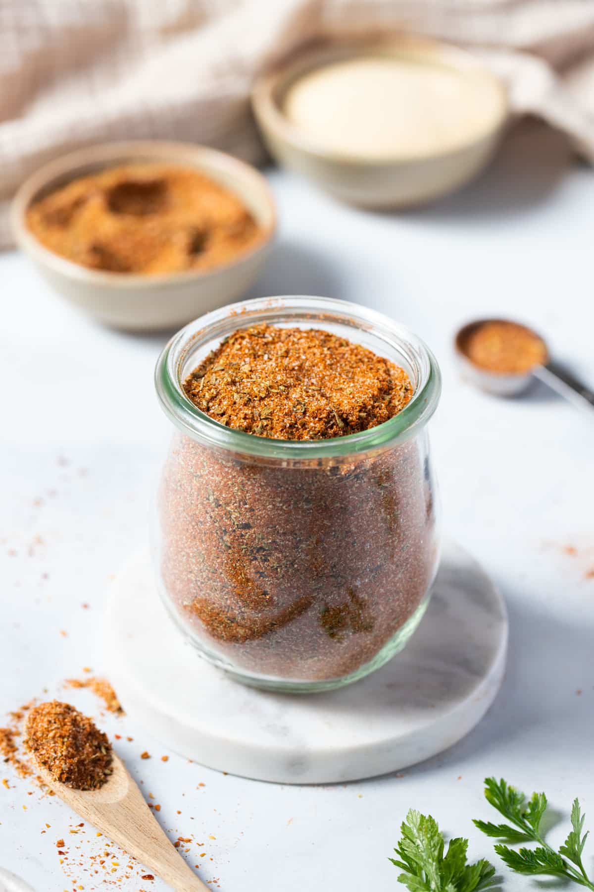 a jar of taco seasoning on a table.