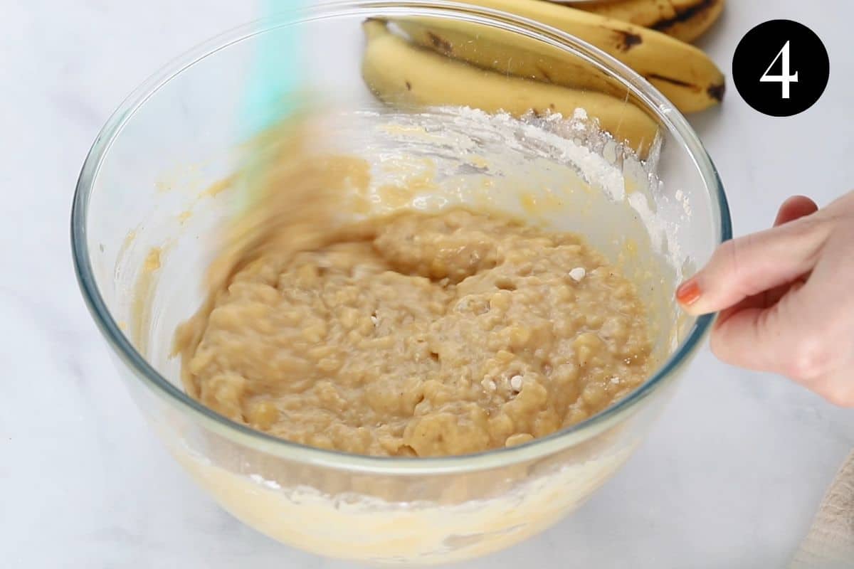 muffin mixture being stirred in a bowl.