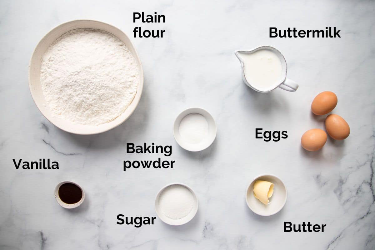 all ingredients for buttermilk pancakes, laid out on a table.