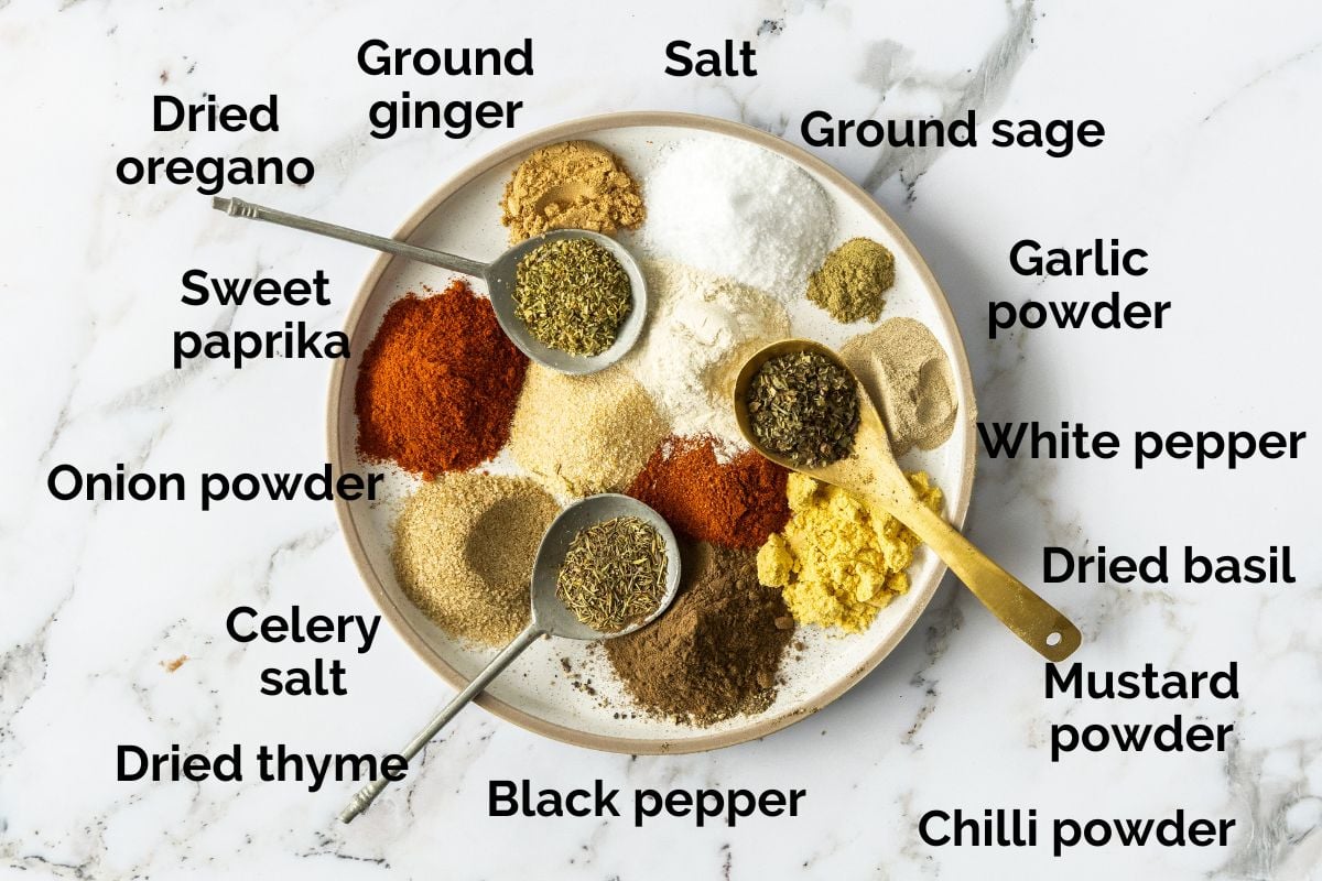 a plate of herbs and spices used for fried chicken coating.