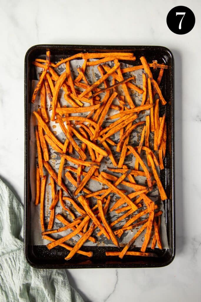 finished fries on a baking tray.