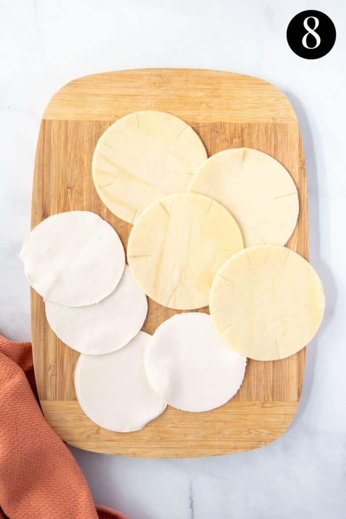 pastry circles on a wooden board.