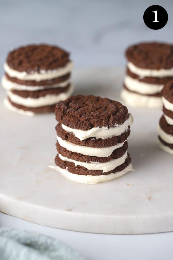 chocolate ripple biscuits in individual stacks, layered with cream.