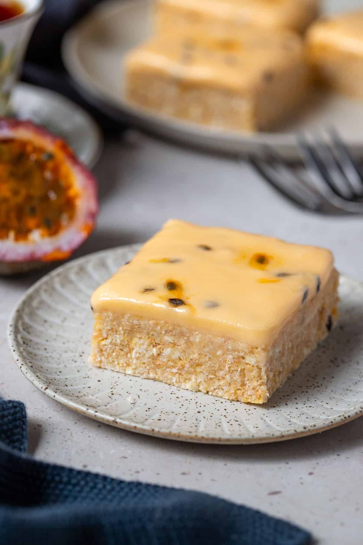a piece of passion fruit slice on a plate.