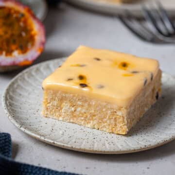 a piece of passion fruit slice on a plate.