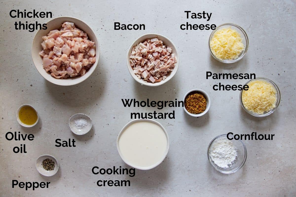 ingredients for creamy chicken pies, laid out on a table.