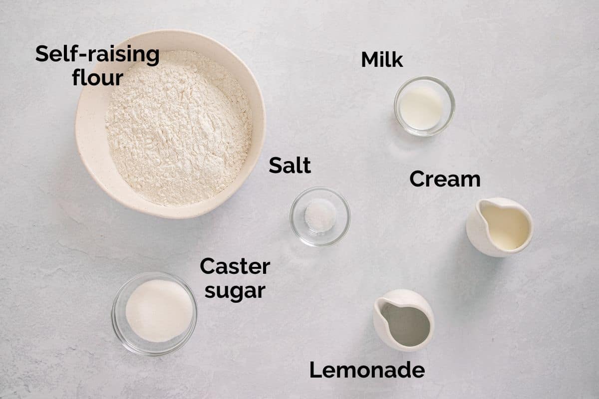 all ingredients for lemonade scones, laid out on a table.