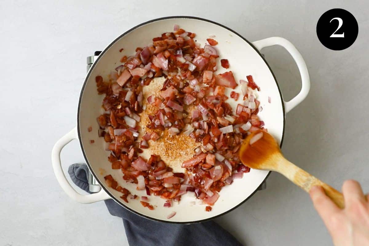 bacon, onion and garlic frying in a pan.
