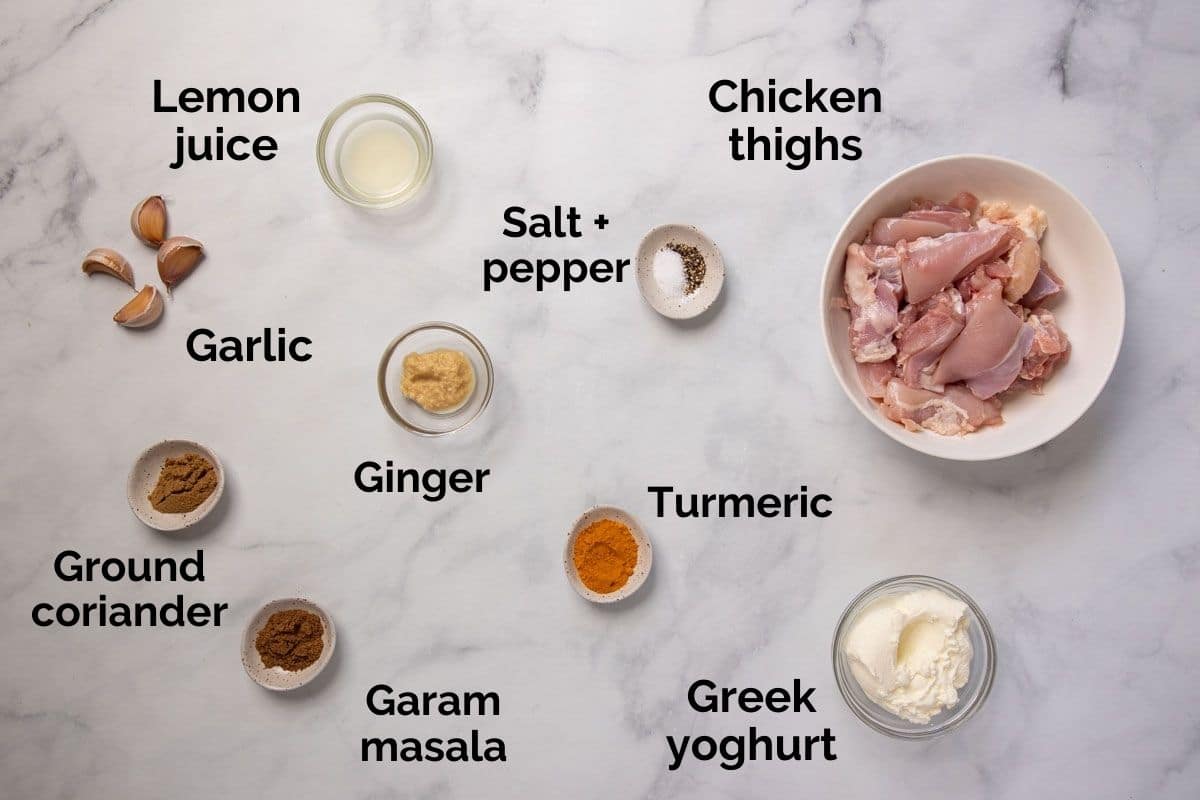 ingredients for yoghurt marinade for chicken, laid out on a table.