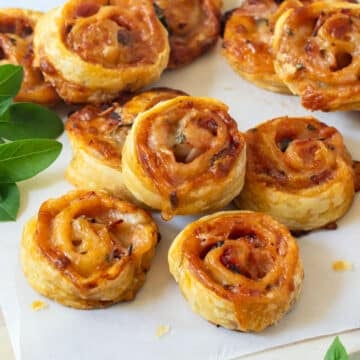 pizza scrolls on a wooden board.