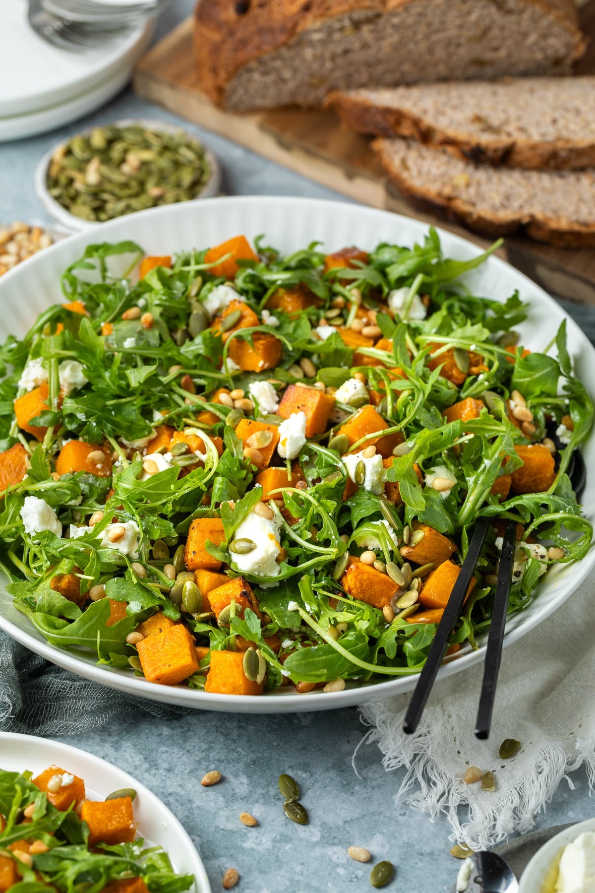 a bowl of salad on a table. 