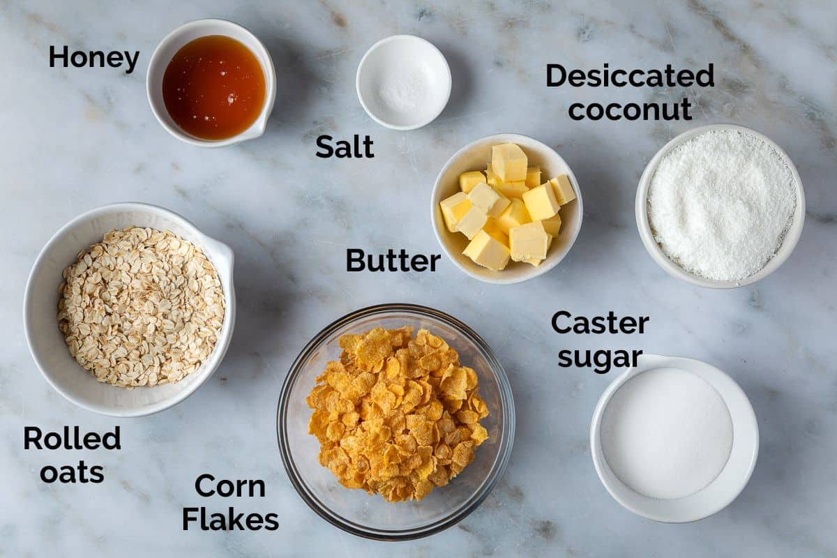 all ingredients for cornflake slice, laid out on a table.