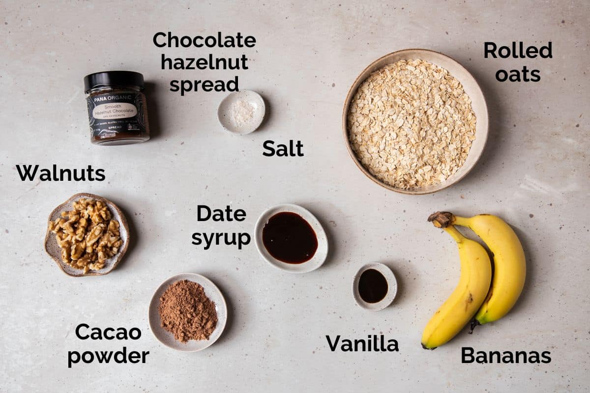 all ingredients for chocolate porridge, laid out on a table.