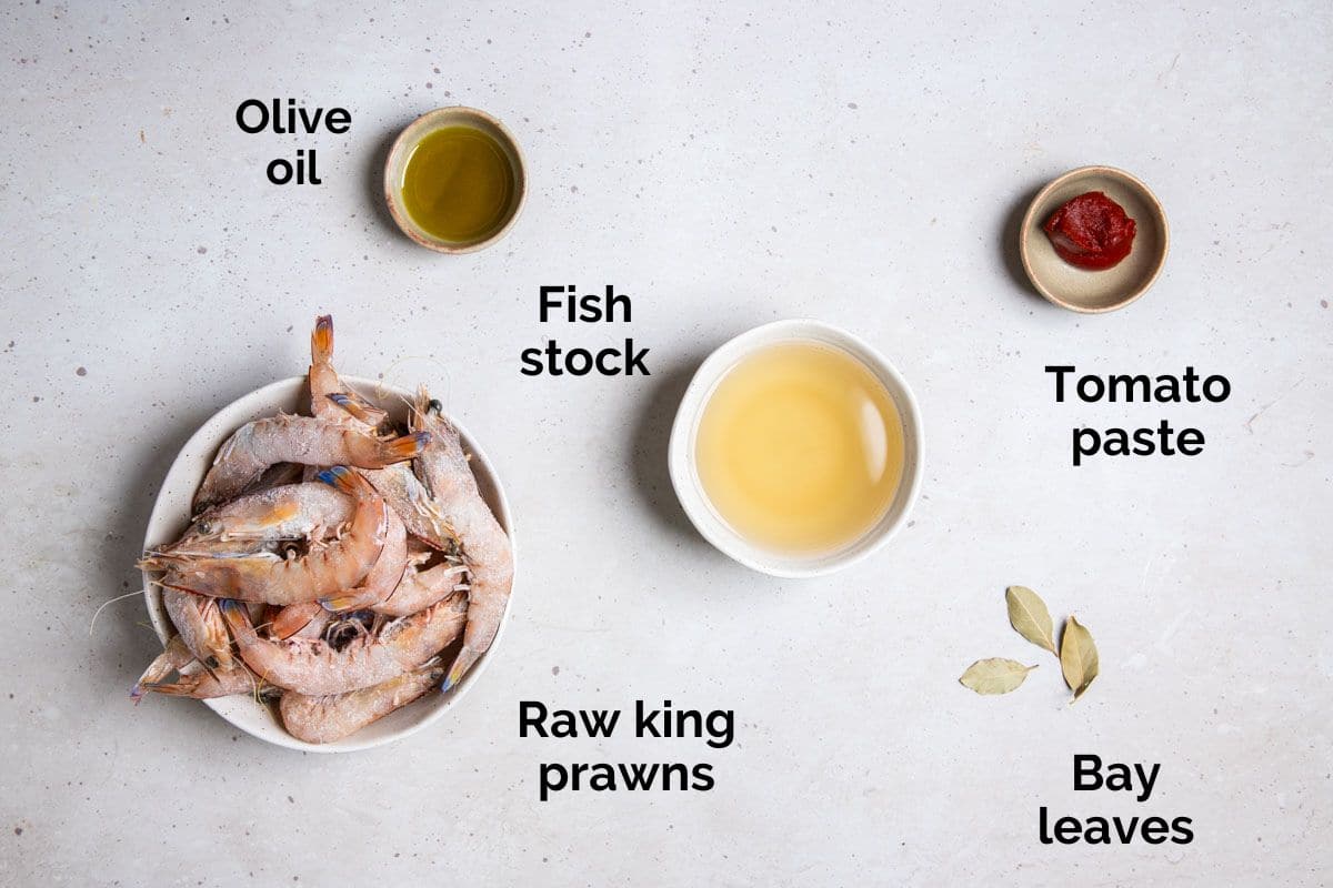 ingredients for homemade prawn stock, laid out on a table.