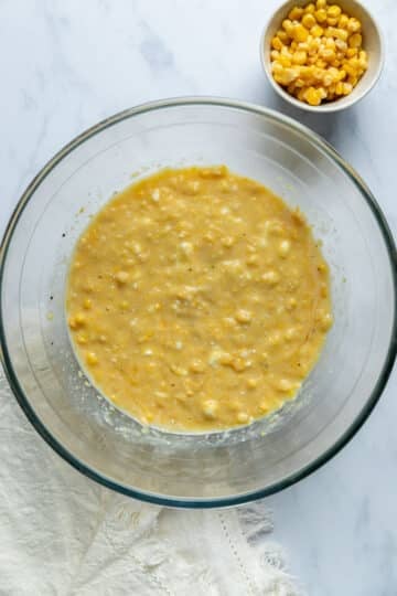 creamed corn mixture in a glass bowl.