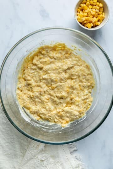 corn fritter batter in a mixing bowl.