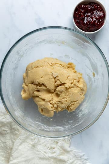 prepared biscuit dough in a glass bowl.