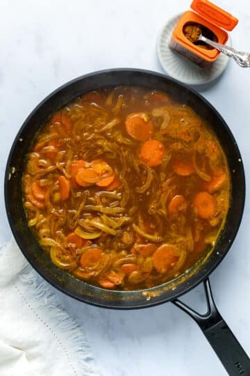 curry sauce and vegetables in a pan.