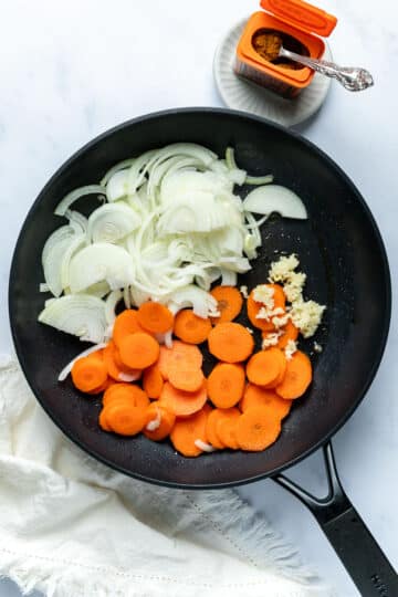 sliced vegetables in a pan.