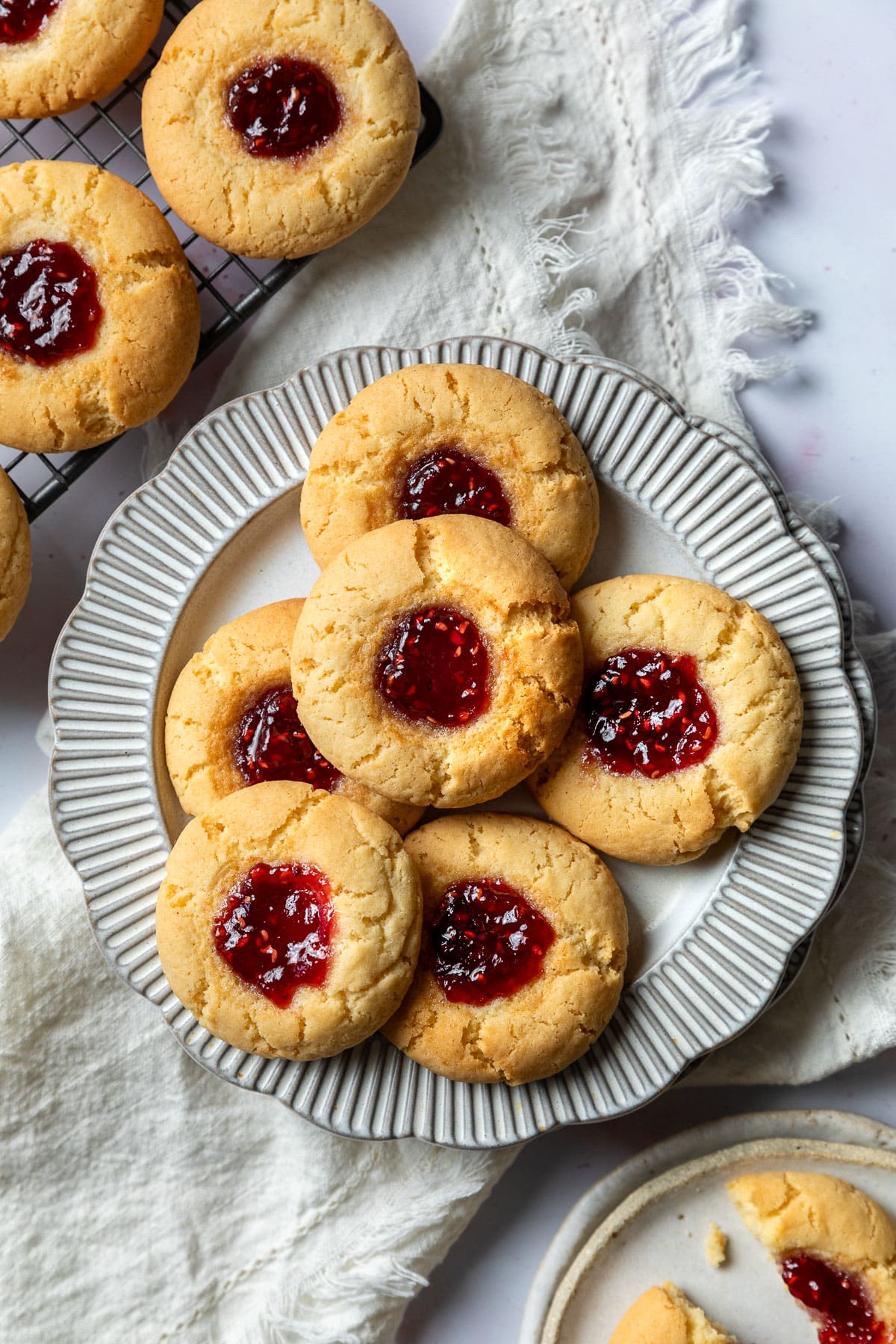 a plate of jam drop biscuits, on a table.