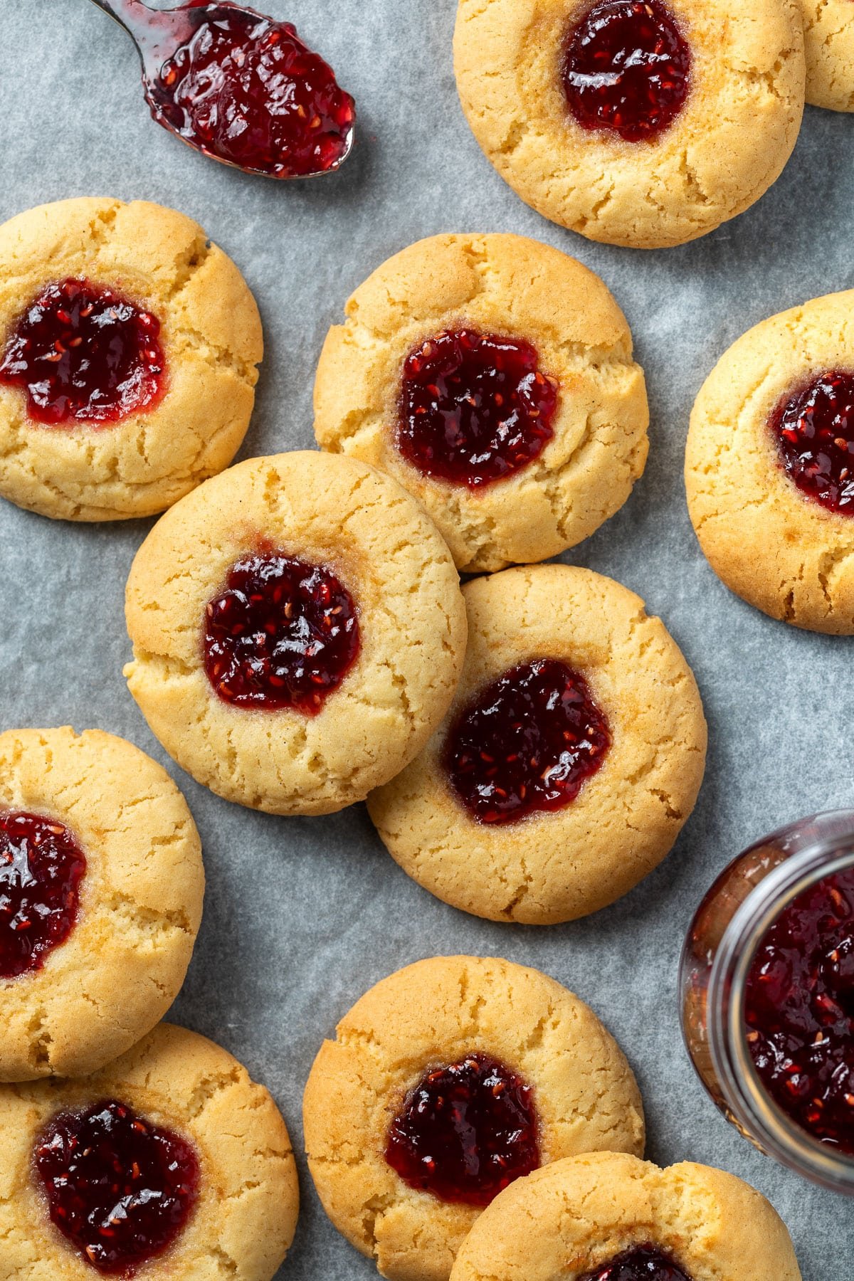 biscuits, filled with jam and arranged on a tray.