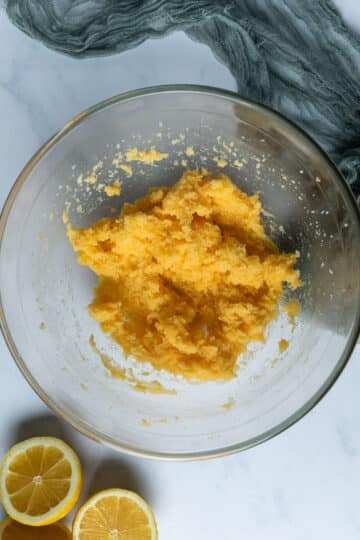 pudding mixture in a bowl. the egg yolks have been mixed into the butter.