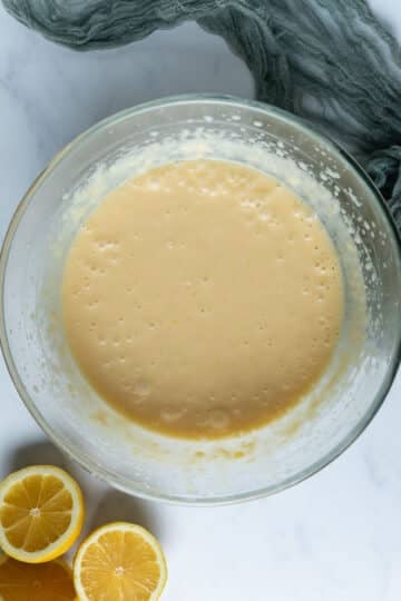 lemon pudding batter, in a mixing bowl.