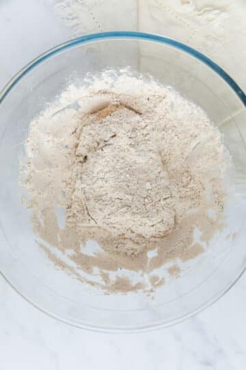 a chicken fillet coated in flour mixture.