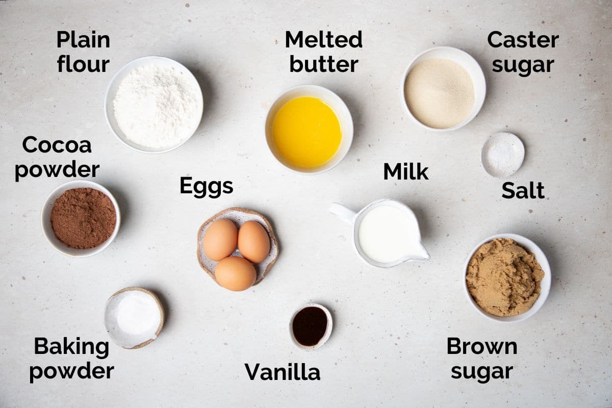 all ingredients for self saucing chocolate pudding, laid out on a table.